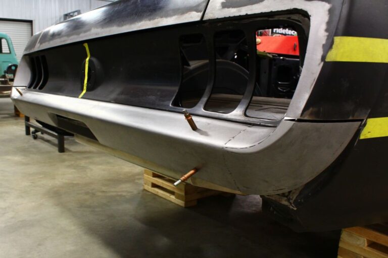 Custom 1969 Fastback Mustang with supercharged coyote engine rear bumper fabrication