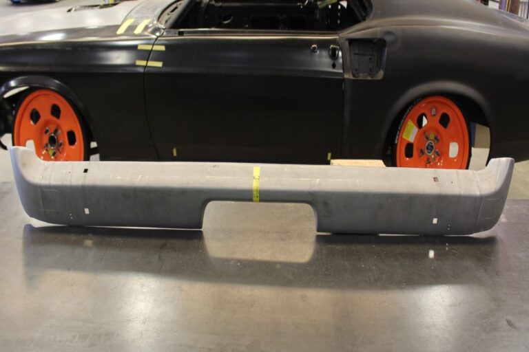 Custom 1969 Fastback Mustang with supercharged coyote engine rear bumper fabrication