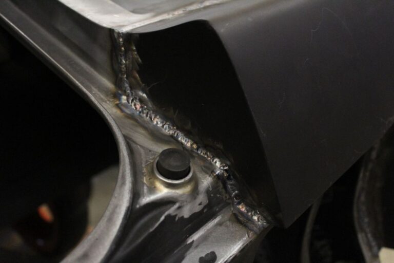 Custom 1969 Fastback Mustang with supercharged coyote engine rear end fabrication