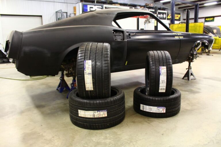 Custom 1969 Fastback Mustang with supercharged coyote engine tires